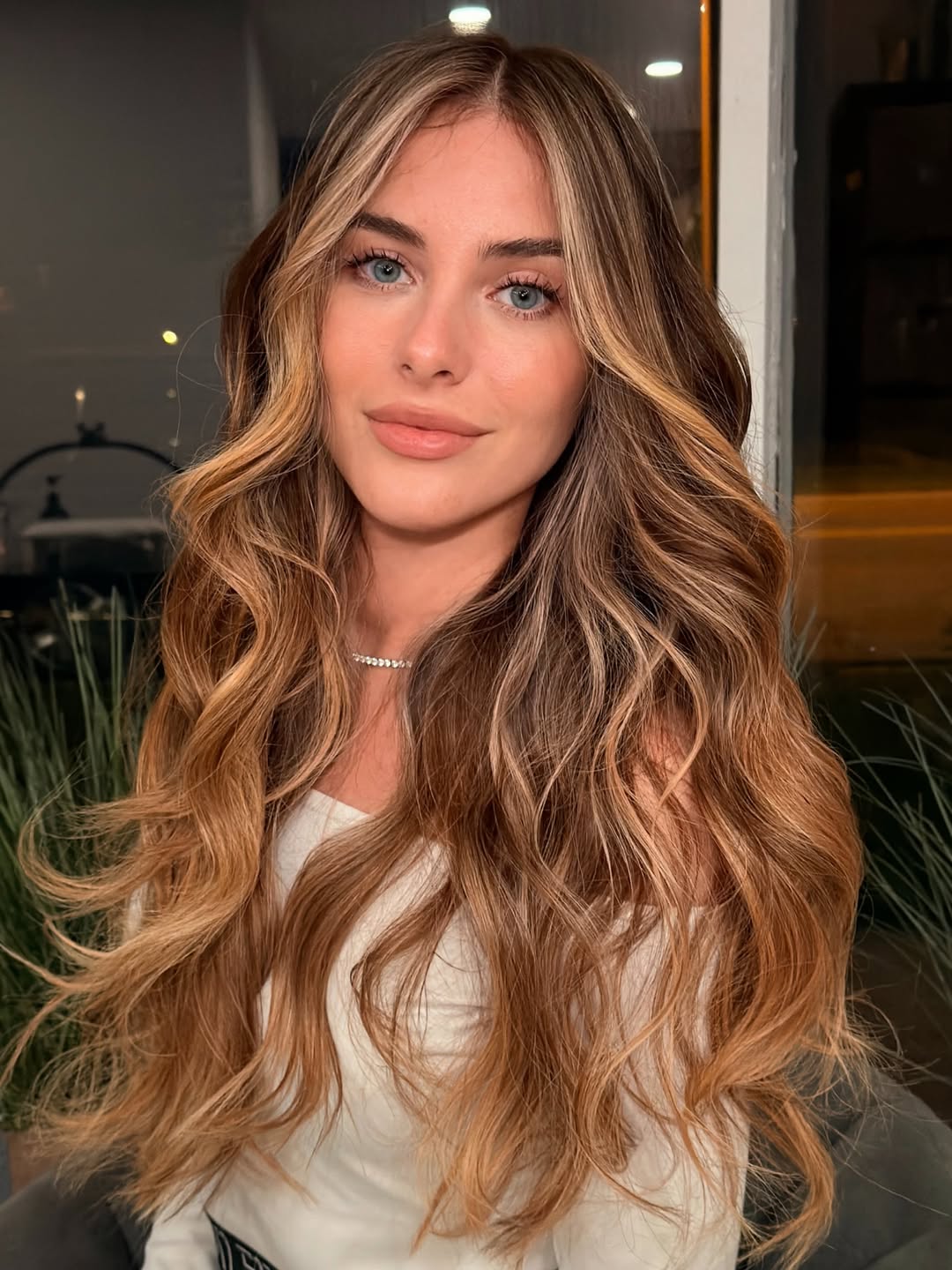 Honey Blonde Waves With Face Framing Highlights