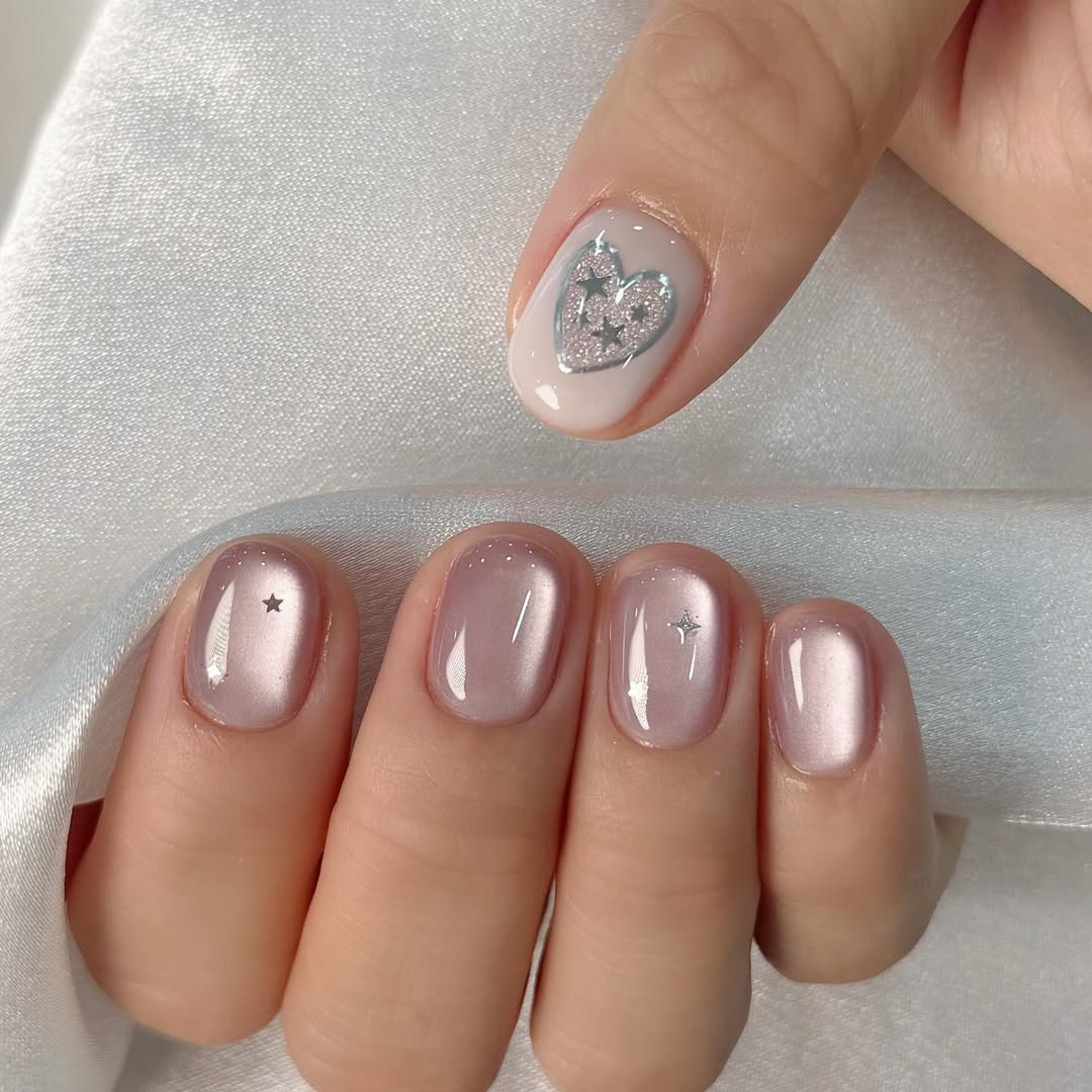 Iridescent Pink Shimmer Short Round Nails with Heart Accent