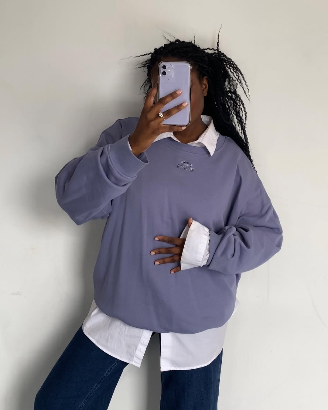 Lavender Sweatshirt Over White Button-Down Jeans Combo