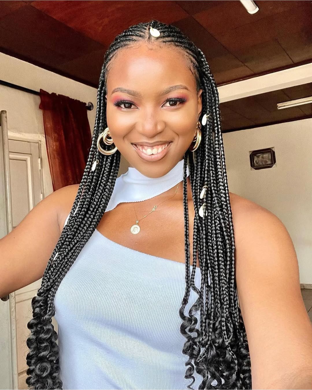 Long Wavy Box Braids With Gold Accents