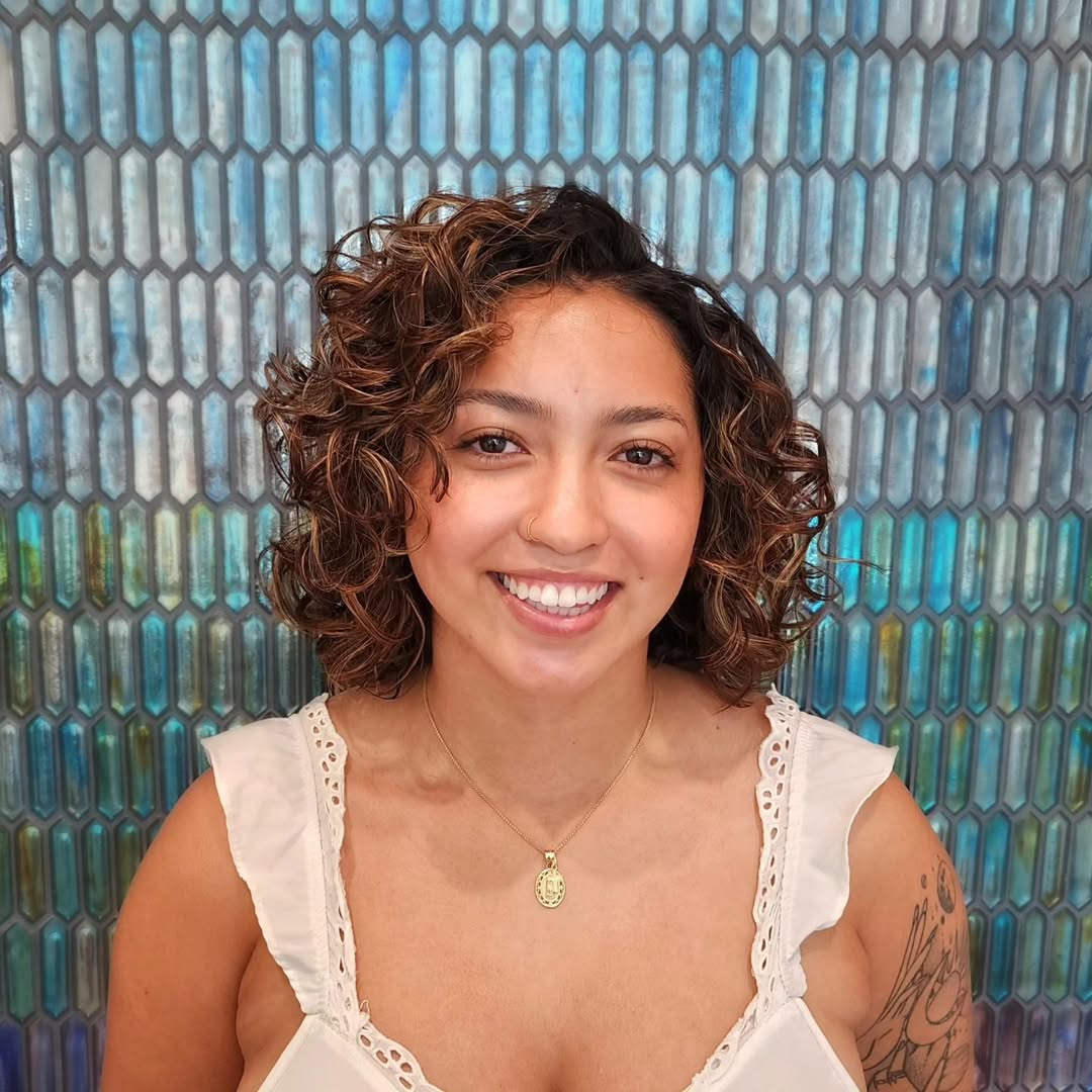 Luminous Curly Bob With Golden Highlights