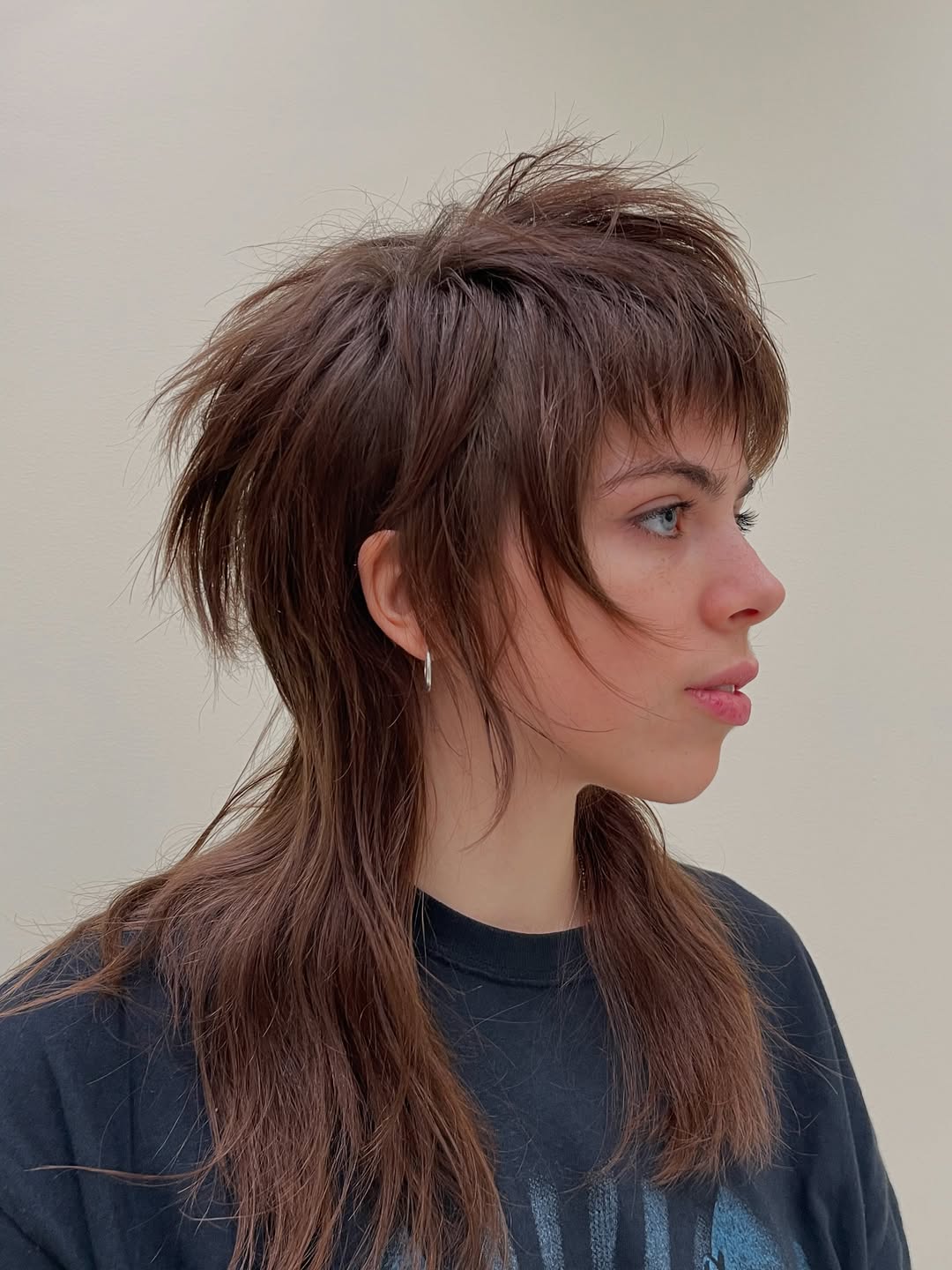 Modern Mid-Length Shag With Wispy Bangs