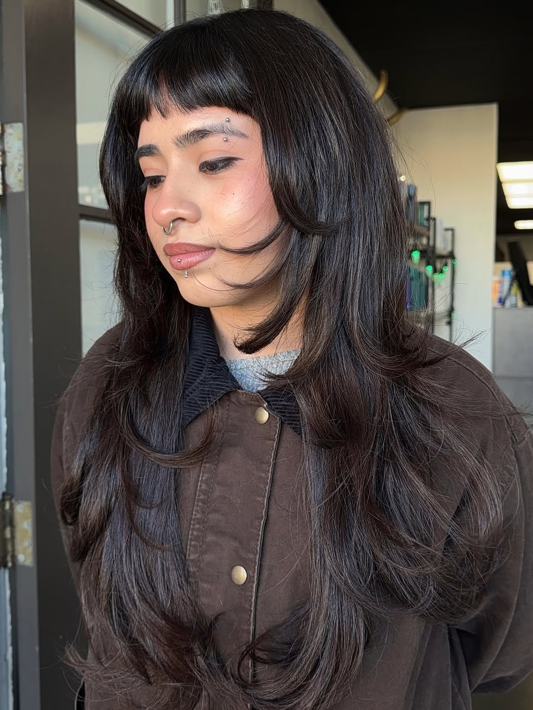 Modern Mullet With Heavy Angled Face Framing Layers