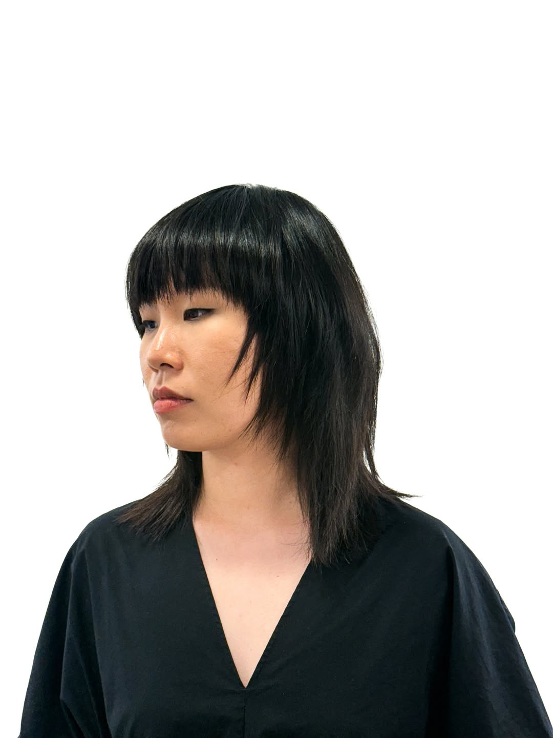 Modern Shag Haircut With Full Fringe Black Hair