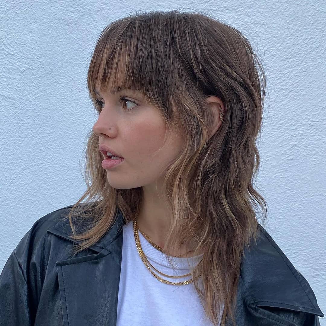 Modern Shag On Wavy Brunette Hair With Bangs