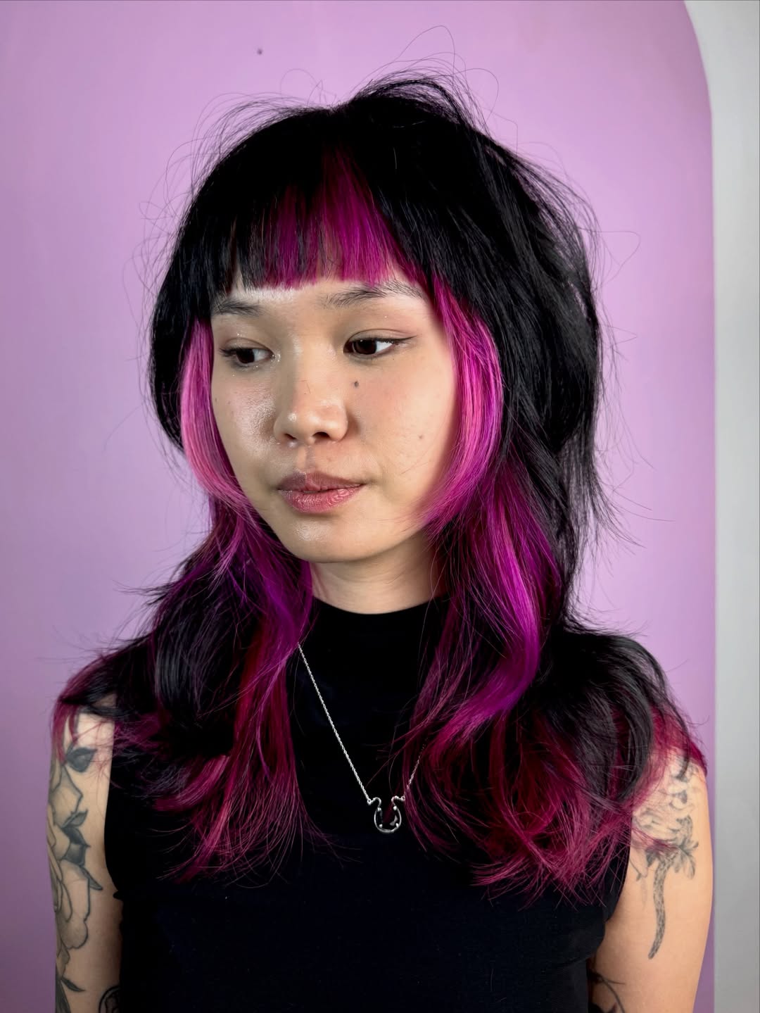 Modern Shag with Vivid Pink Highlights and Blunt Bangs