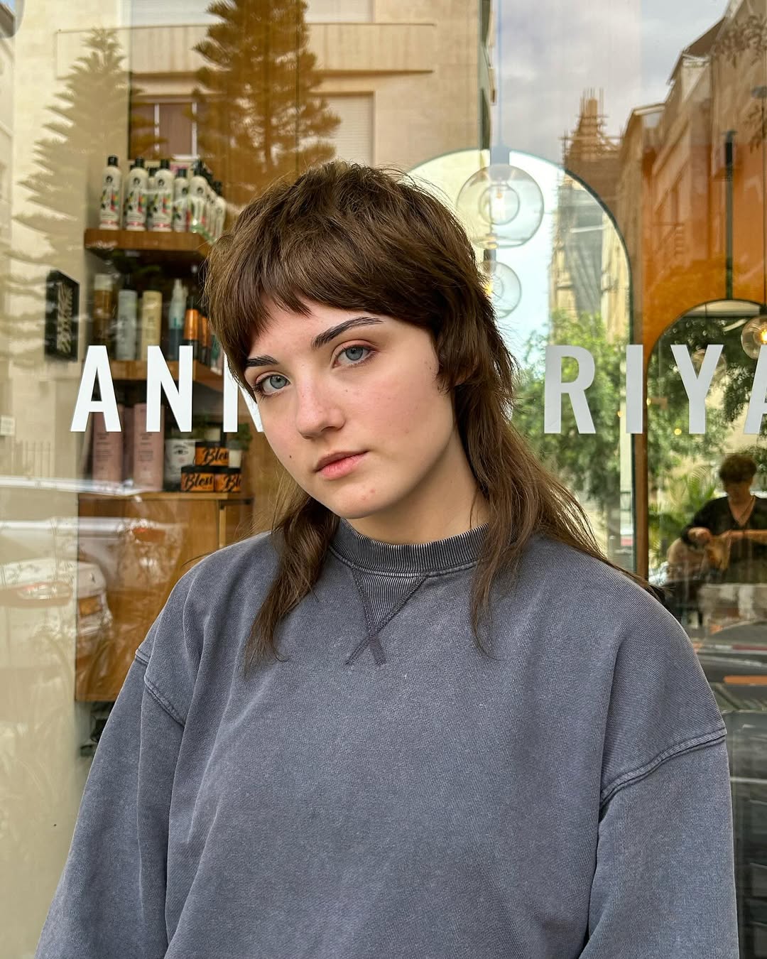Modern Shaggy Brunette Mullet With Wispy Bangs