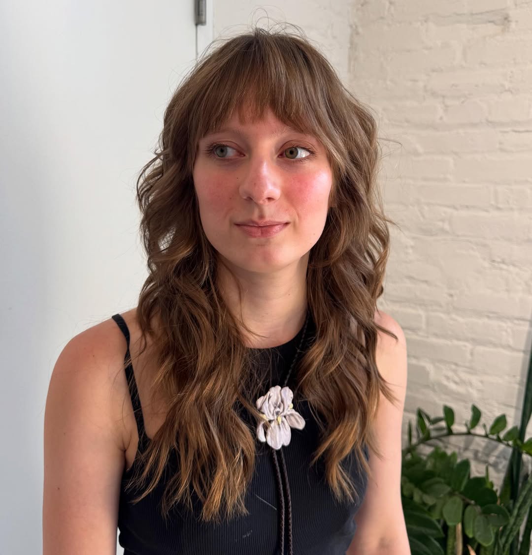 Modern Wavy Shag Cut With Wispy Bangs
