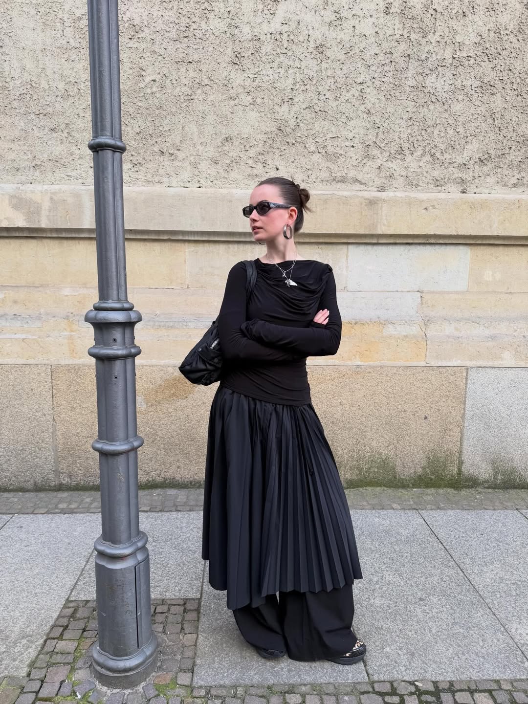 Monochromatic Accordion Pleat Skirt Layered Over Trousers