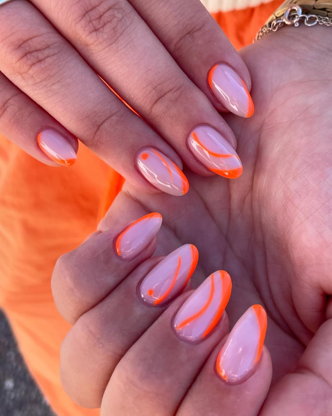 Neon Orange Swirl and French Almond Nails