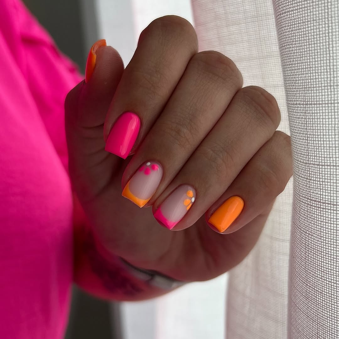 Neon Pink and Orange French Tips with Floral Accents