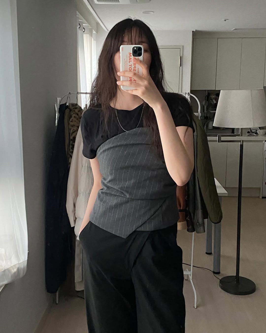 Pinstripe Vest Layered Over Black Tee