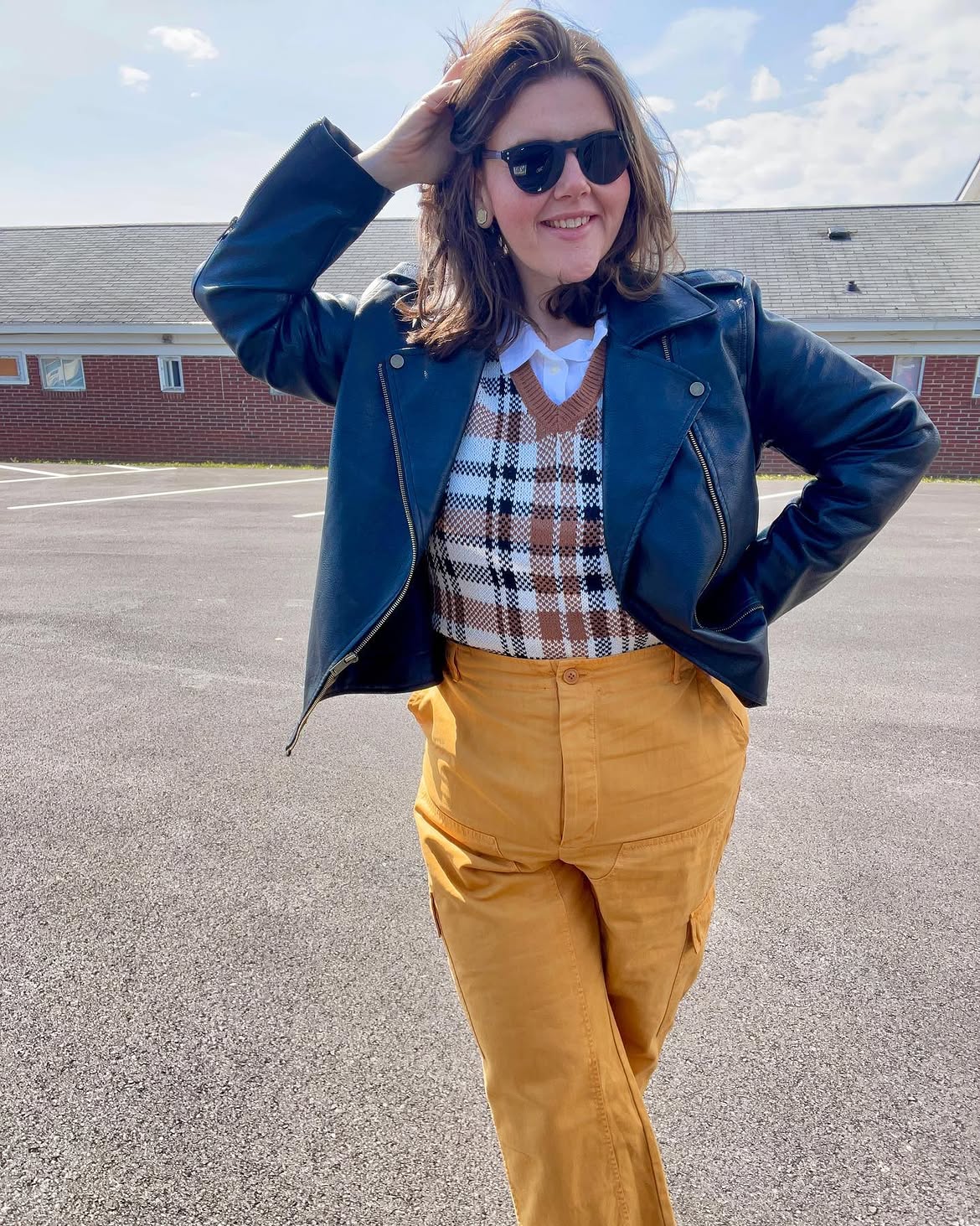 Plaid Sweater Vest With Moto Jacket And Cargo Pants