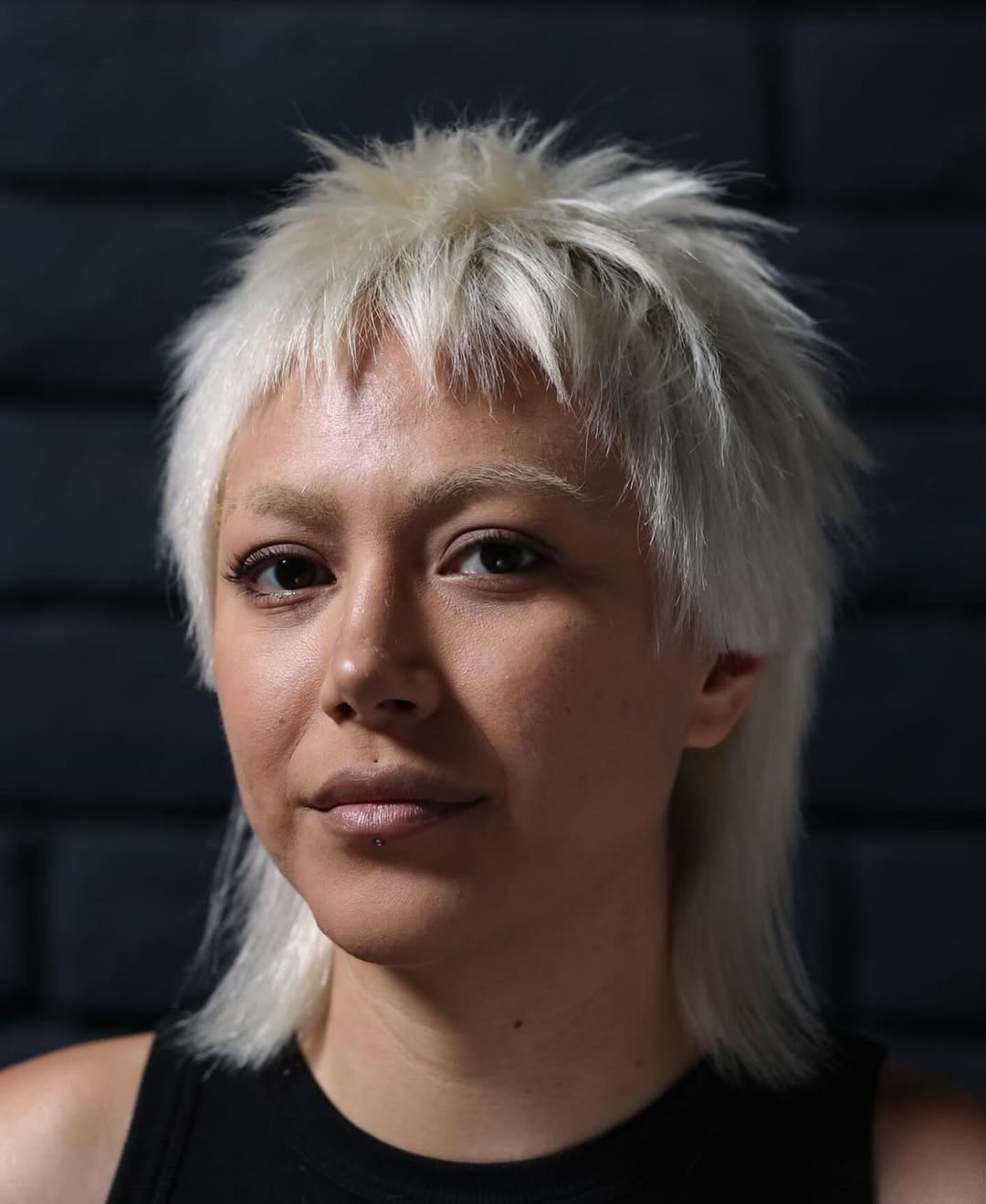 Platinum Blonde Shaggy Mullet With Choppy Bangs