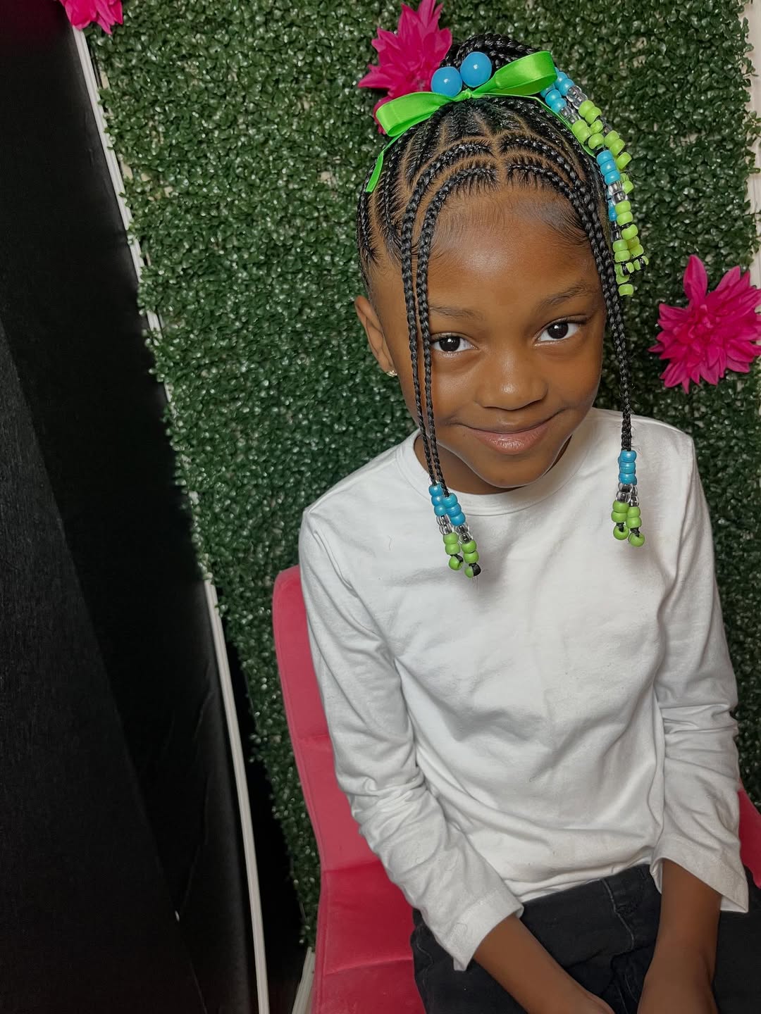 Playful Cornrow Ponytail With Colorful Beads And Bow