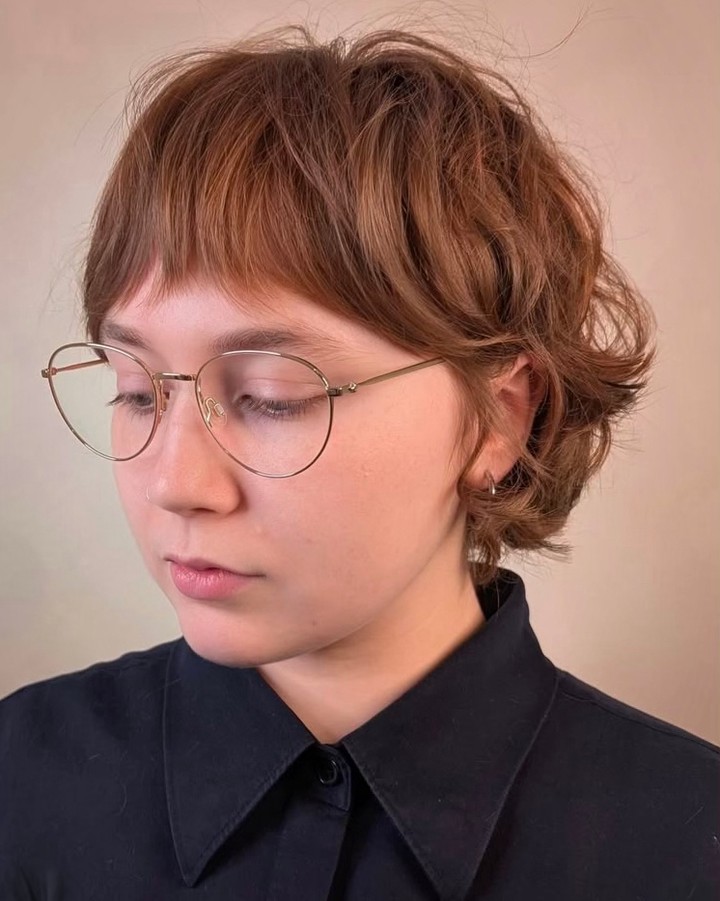 Playful Face-Framing Bangs On Wavy Pixie Shag
