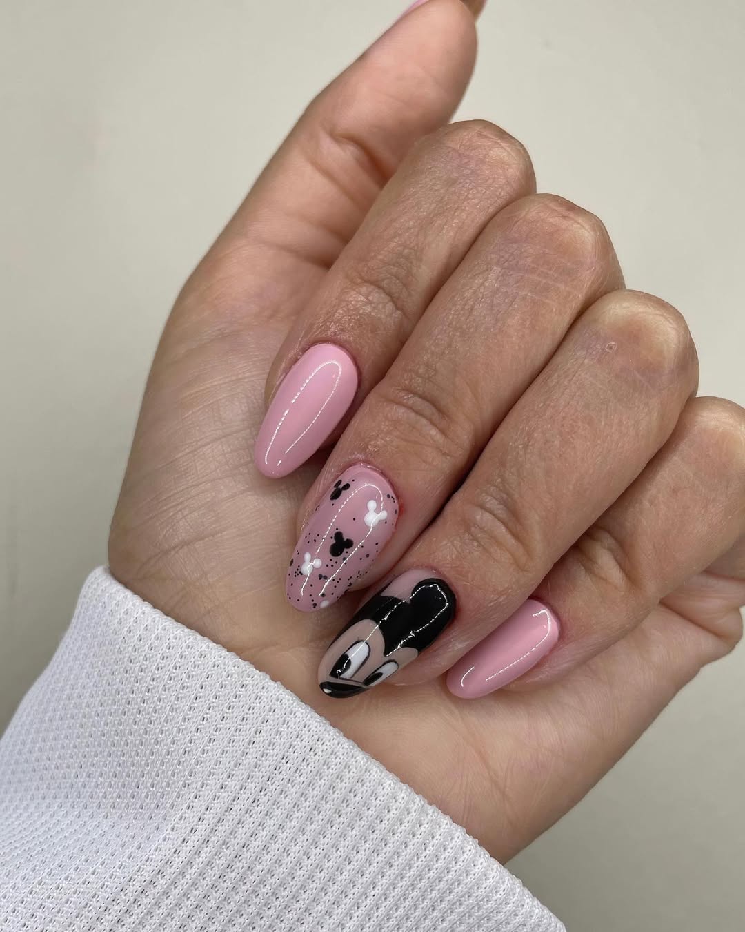 Playful Pink Disney Character Almond Nails