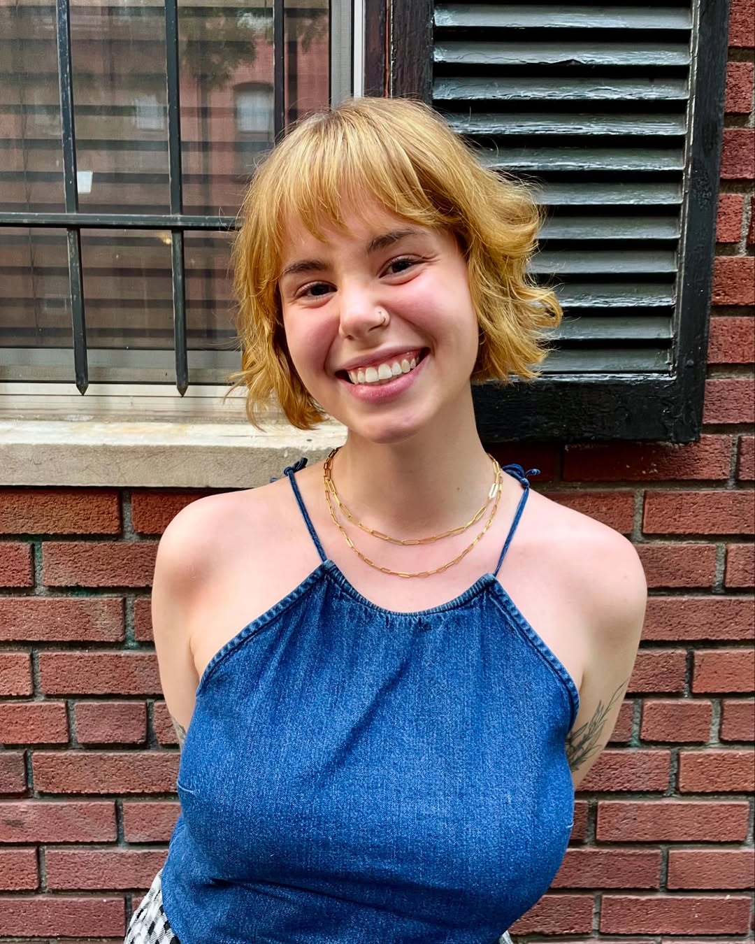 Playful Pixie Bob With Shaggy Bangs In Golden Blonde