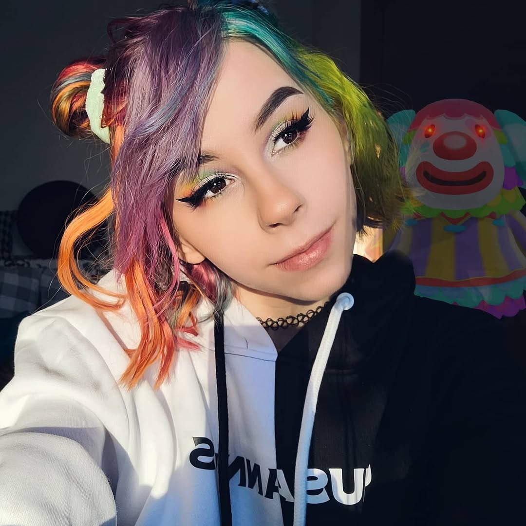 Rainbow Space Buns With Bold Face-Framing Strands