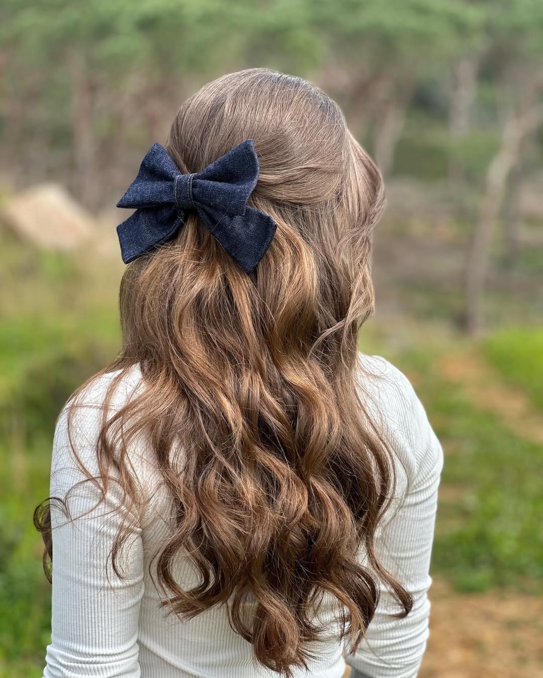 Relaxed Half-Up Style With Denim Bow Clip