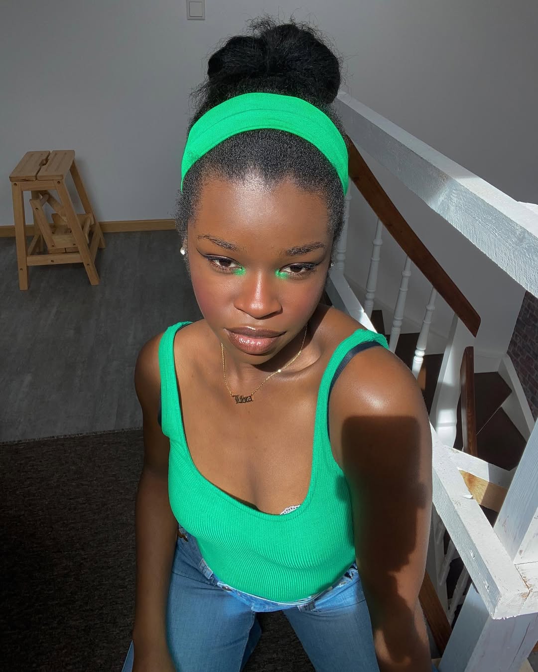 Relaxed High Bun With Vibrant Green Headband