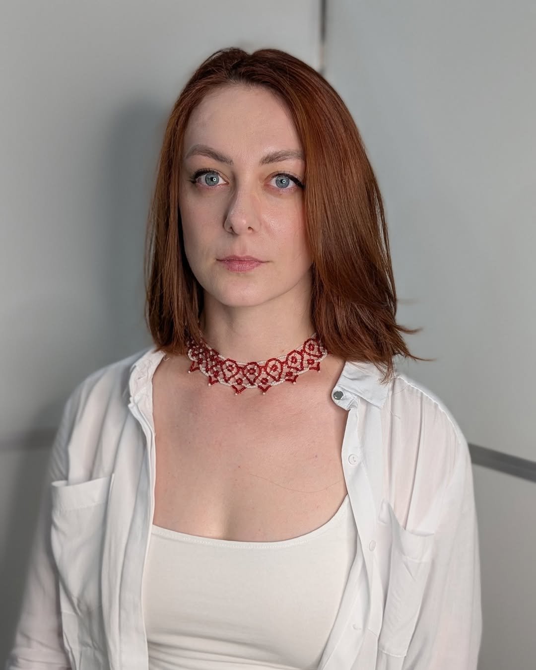 Relaxed Shoulder-Length Ginger Hair With Subtle Waves