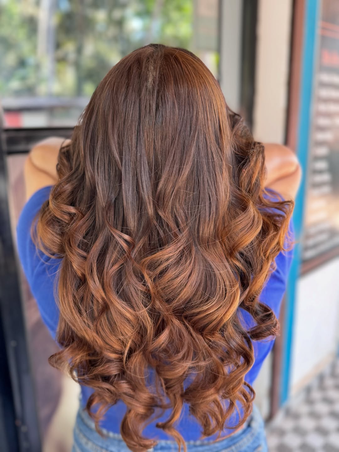 Rich Brunette To Copper Balayage With Polished Curls