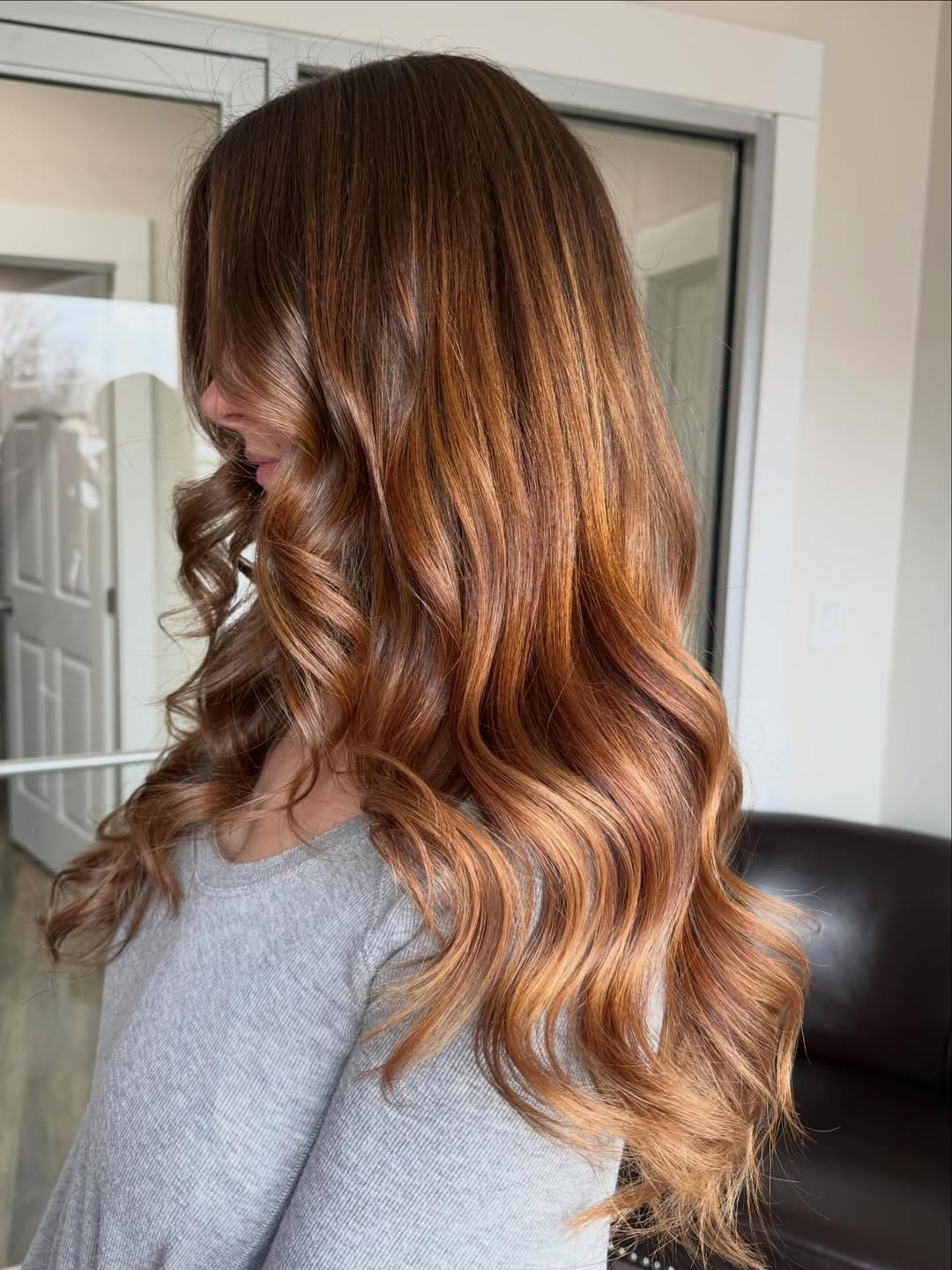 Rich Cinnamon Layers With Voluminous Curls