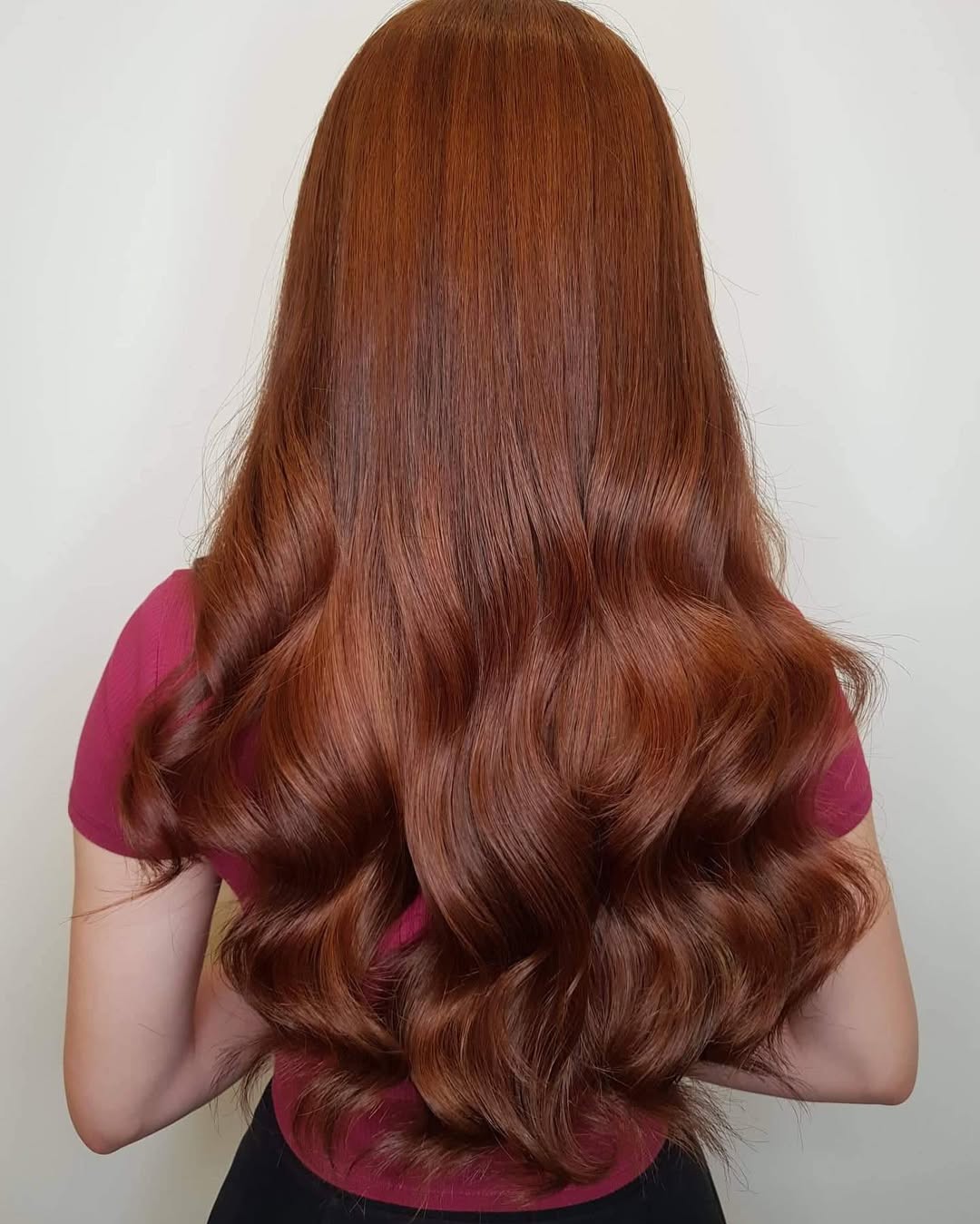 Rich Cinnamon Waves: Long and Lush Brown Hair