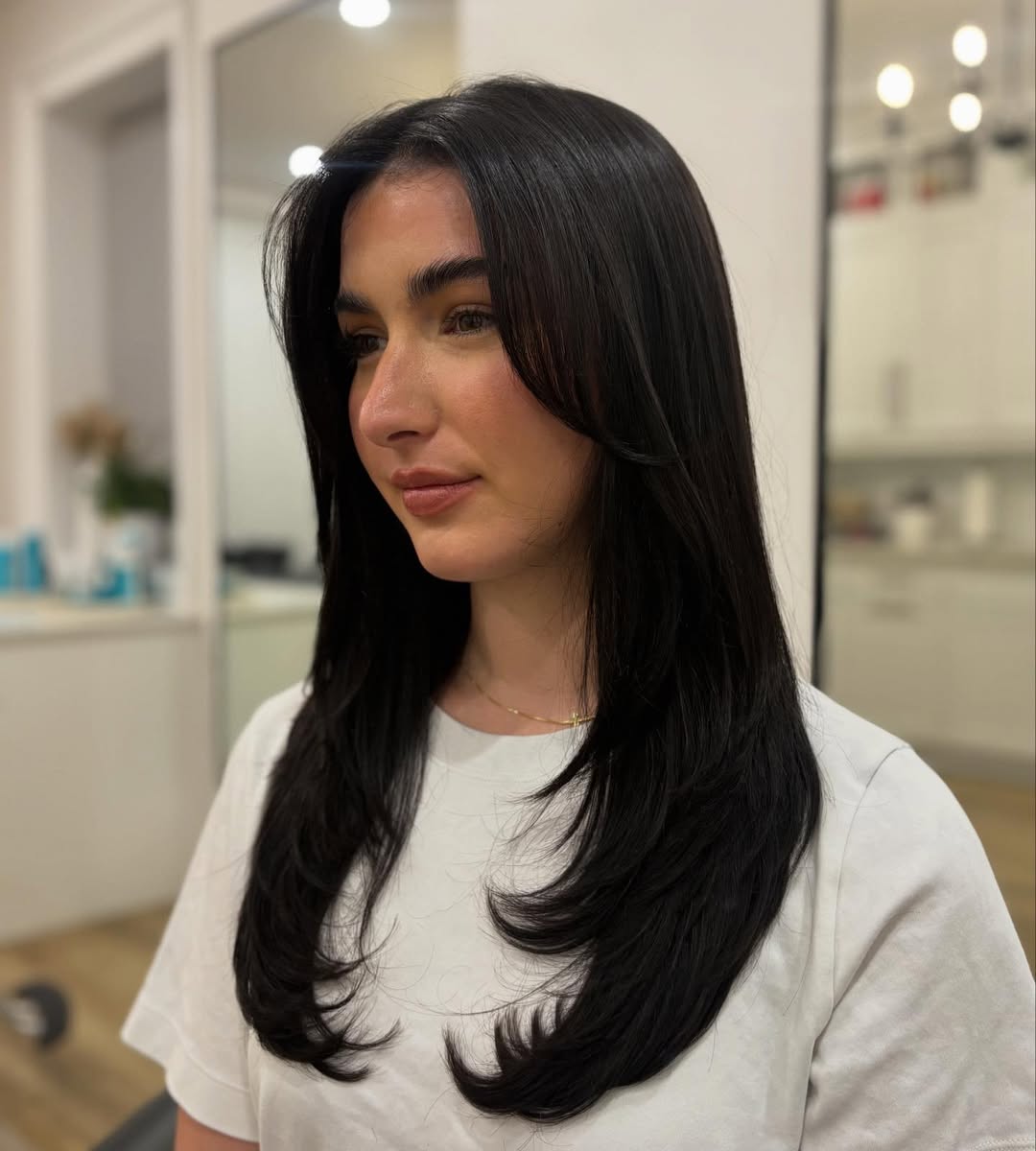 Sculpted Face-Framing Layers With Subtle Curves