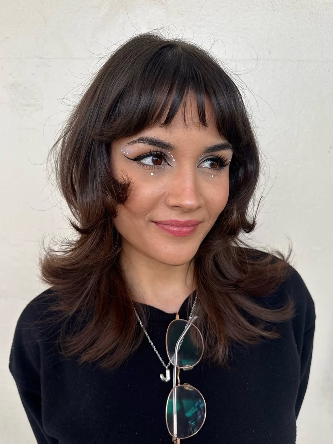 Shaggy Brunette Layers With Wispy Bangs