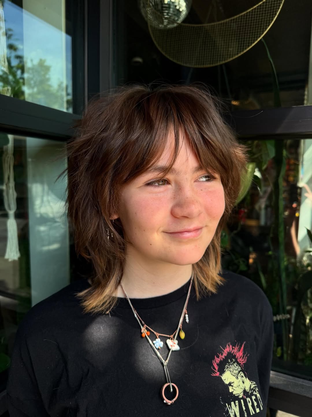 Shaggy Brunette Mullet with Warm Tones