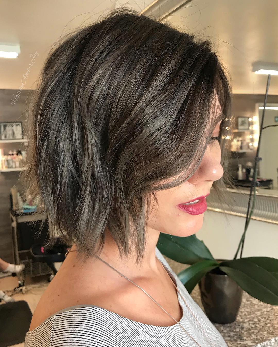 Shaggy Chin-Length Ash Gray Bob with Face-Framing Layers