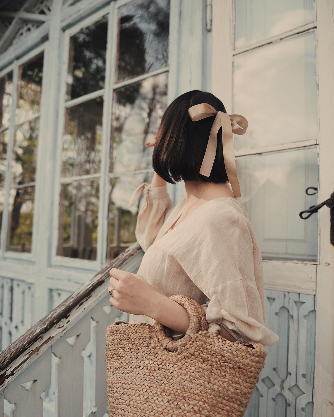 Sleek Blunt Bob With Elegant Ribbon Accessory