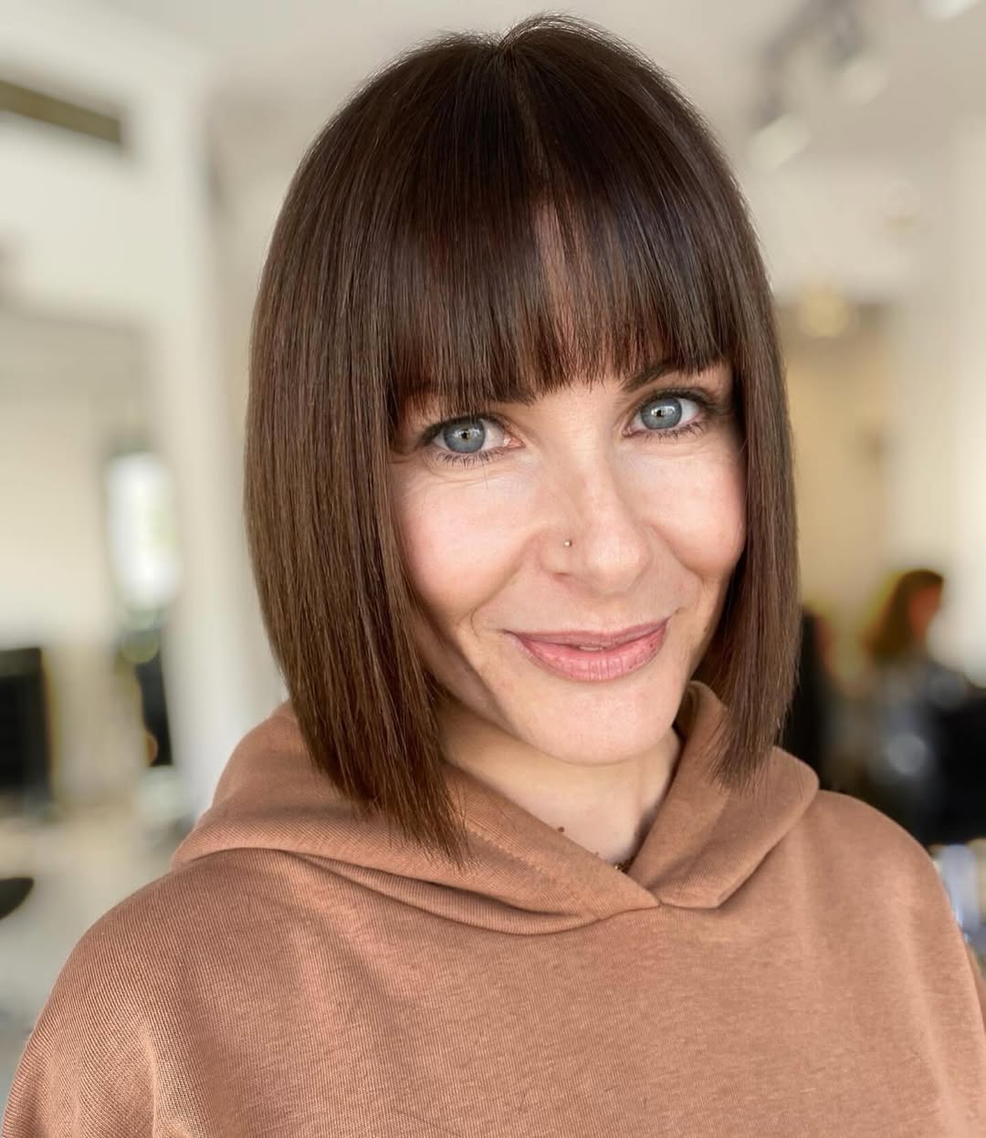 Sleek Blunt Brunette Bob With Full Fringe