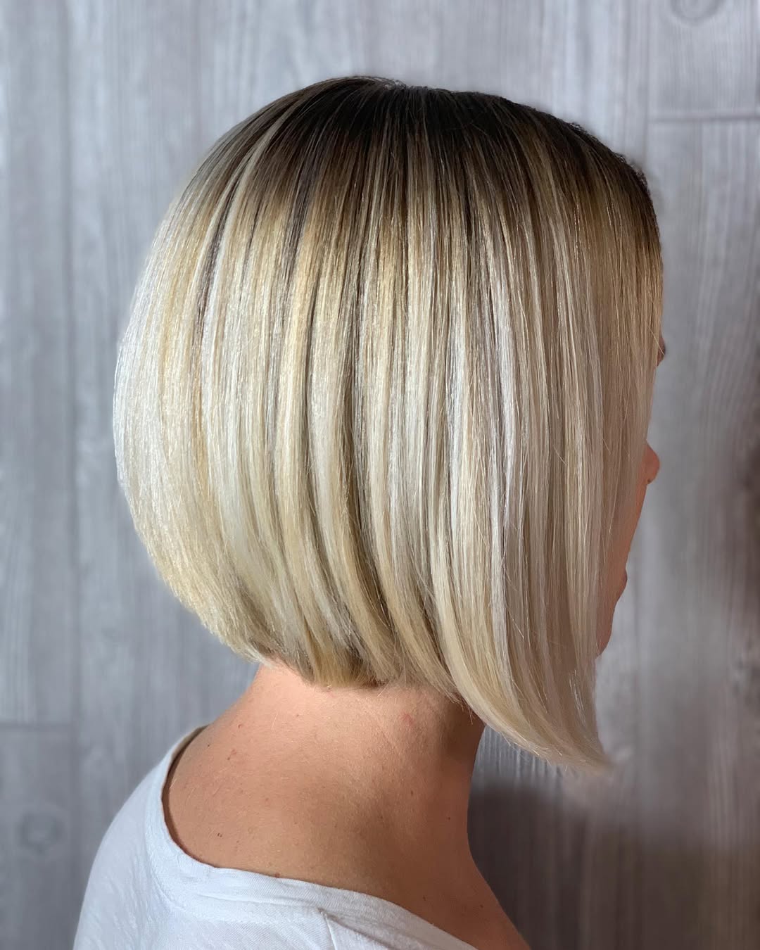 Sleek Chin-Length Blonde Bob with Shadow Root