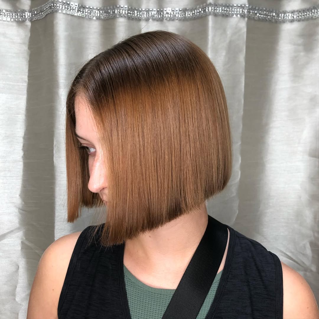 Sleek Chin Length Bob With Copper Brown Color Melt