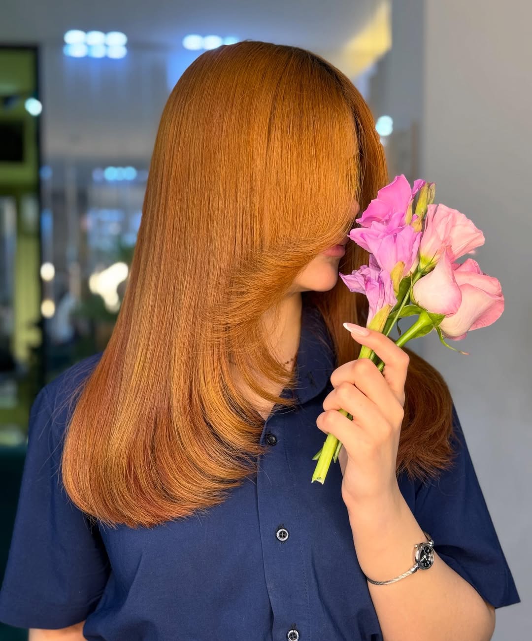 Sleek Deep Copper Layers With Full Blunt Bangs