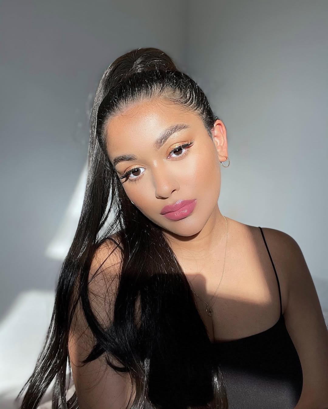 Sleek High Ponytail With Defined Baby Hairs