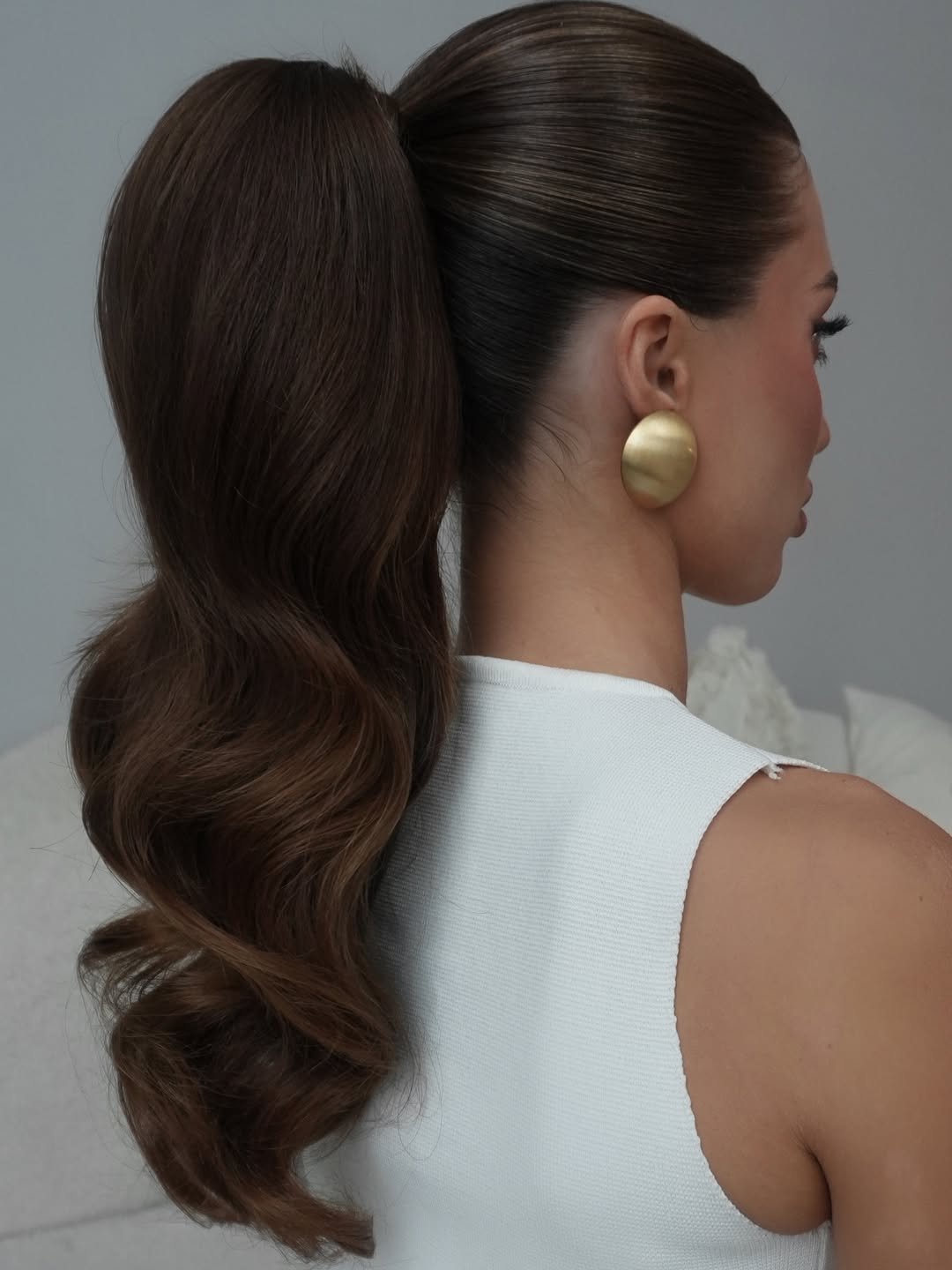 Sleek High Ponytail With Hollywood Waves