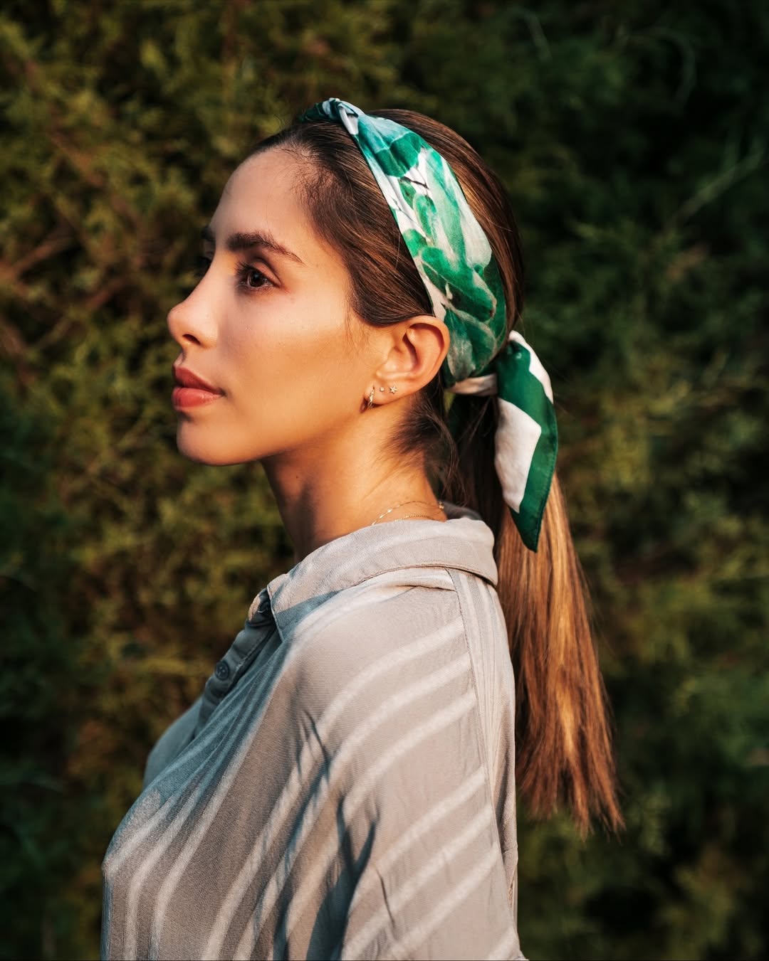 Sleek Low Ponytail With Printed Scarf Headband
