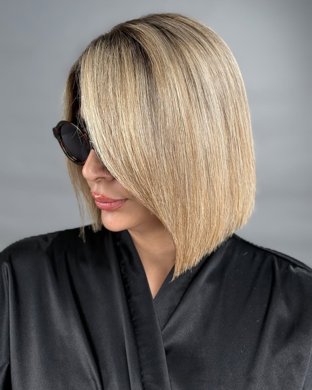 Sleek Side-Parted Blonde Bob With Shadow Root