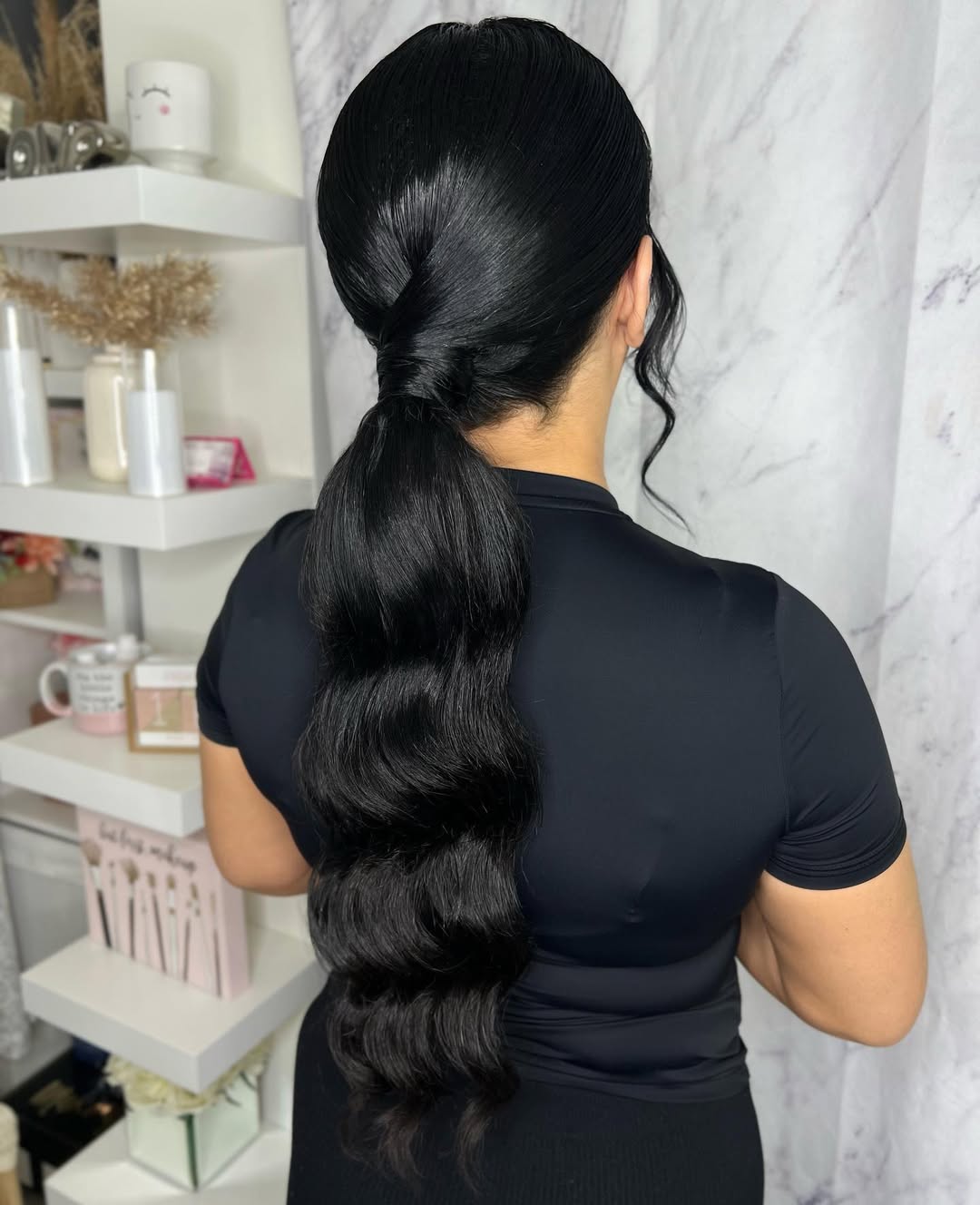 Sleek Twisted Ponytail With Voluminous Waves