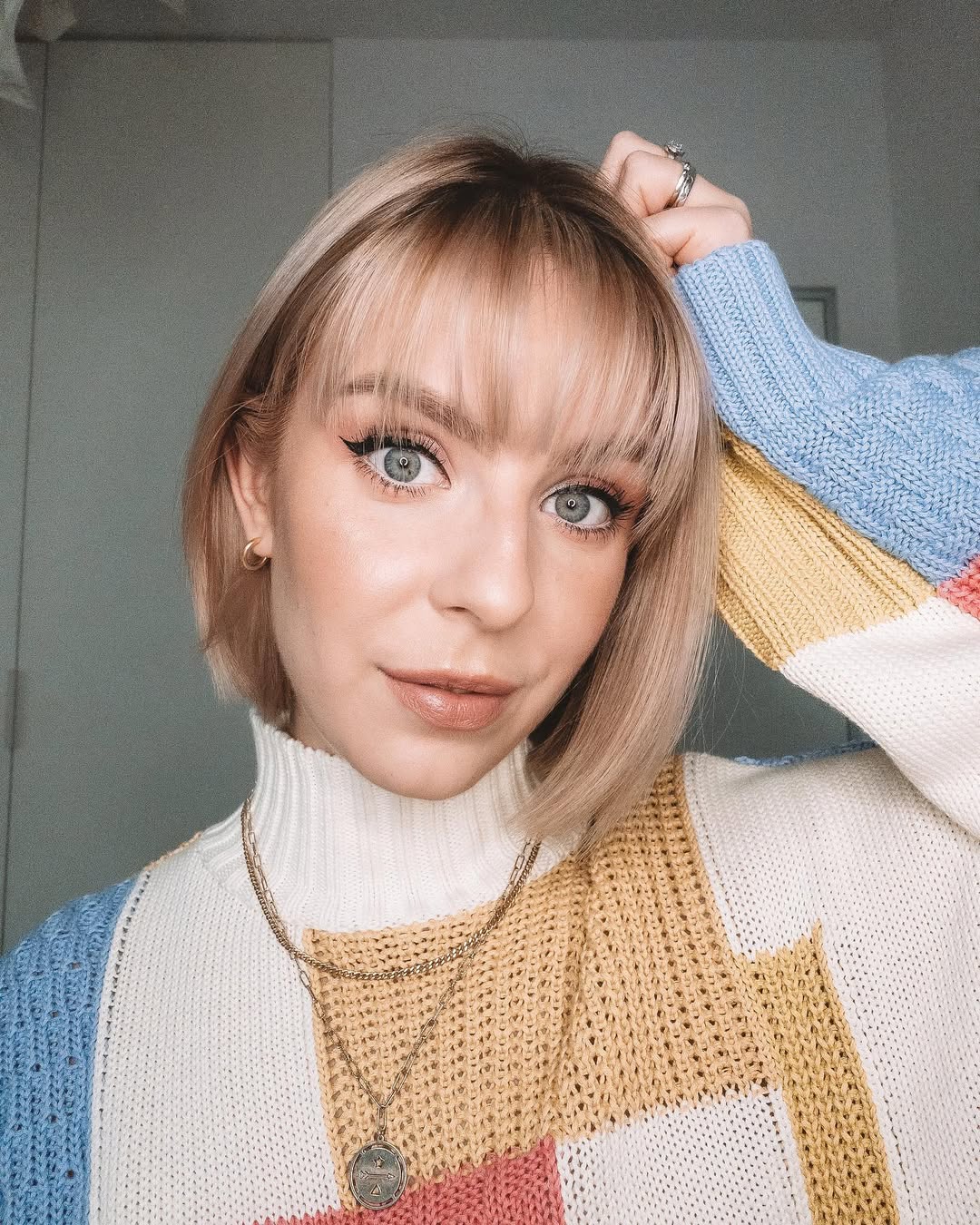 Soft Blonde Bob With Wispy Straight Bangs