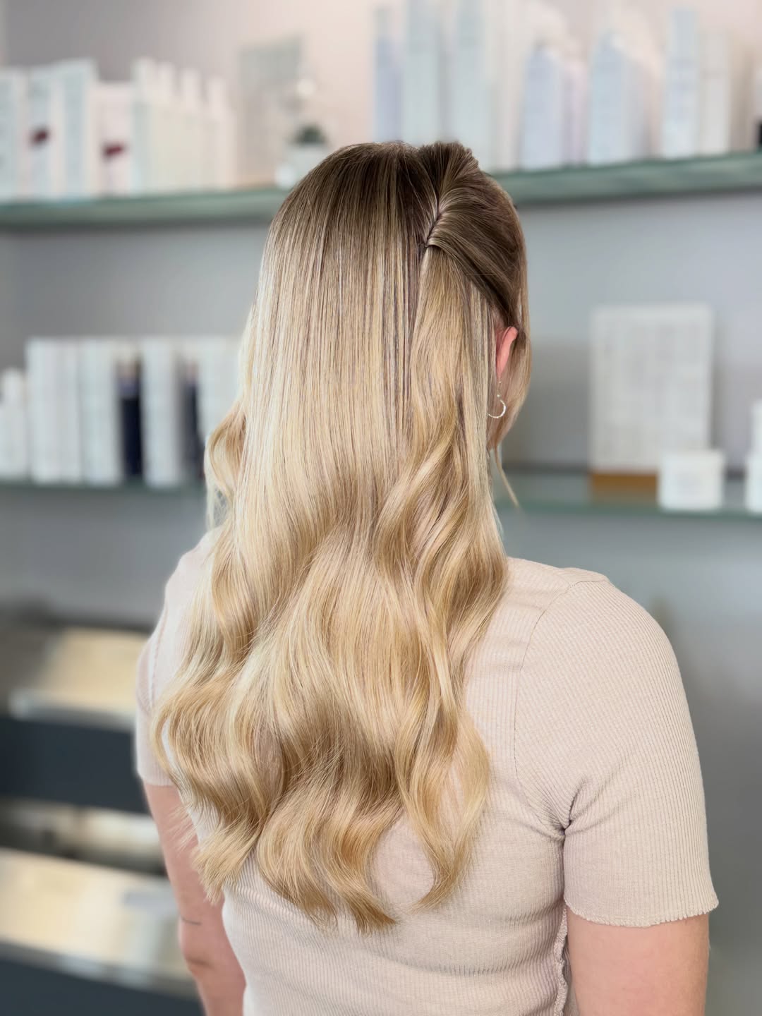 Soft Blonde Waves With Half-Up Twist