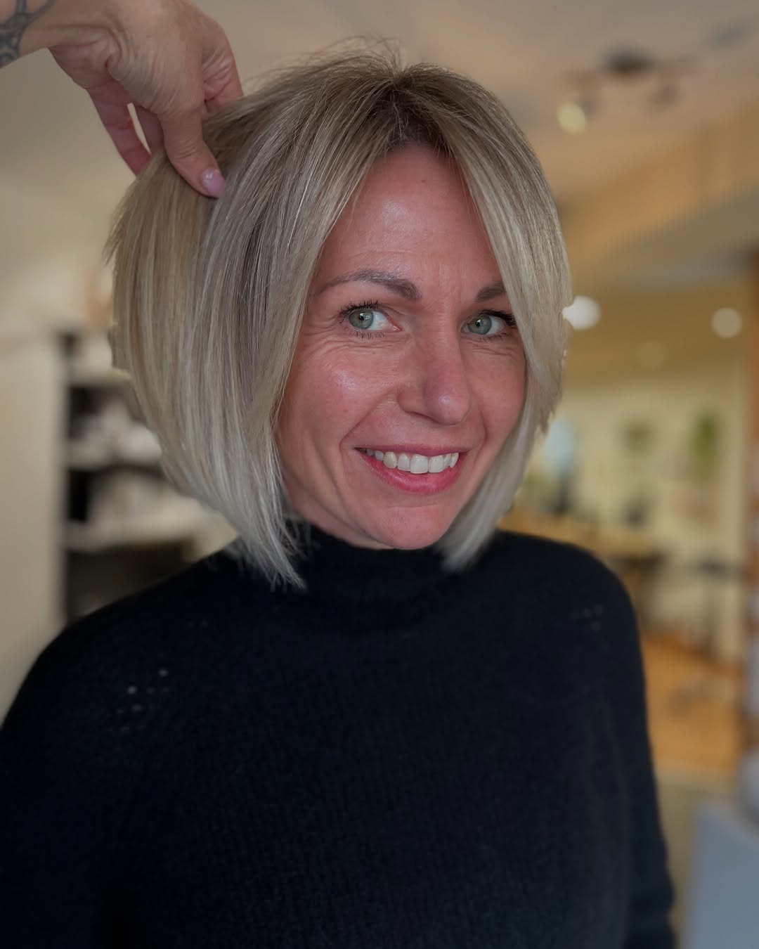 Soft Platinum Blonde Bob With Curtain Bangs