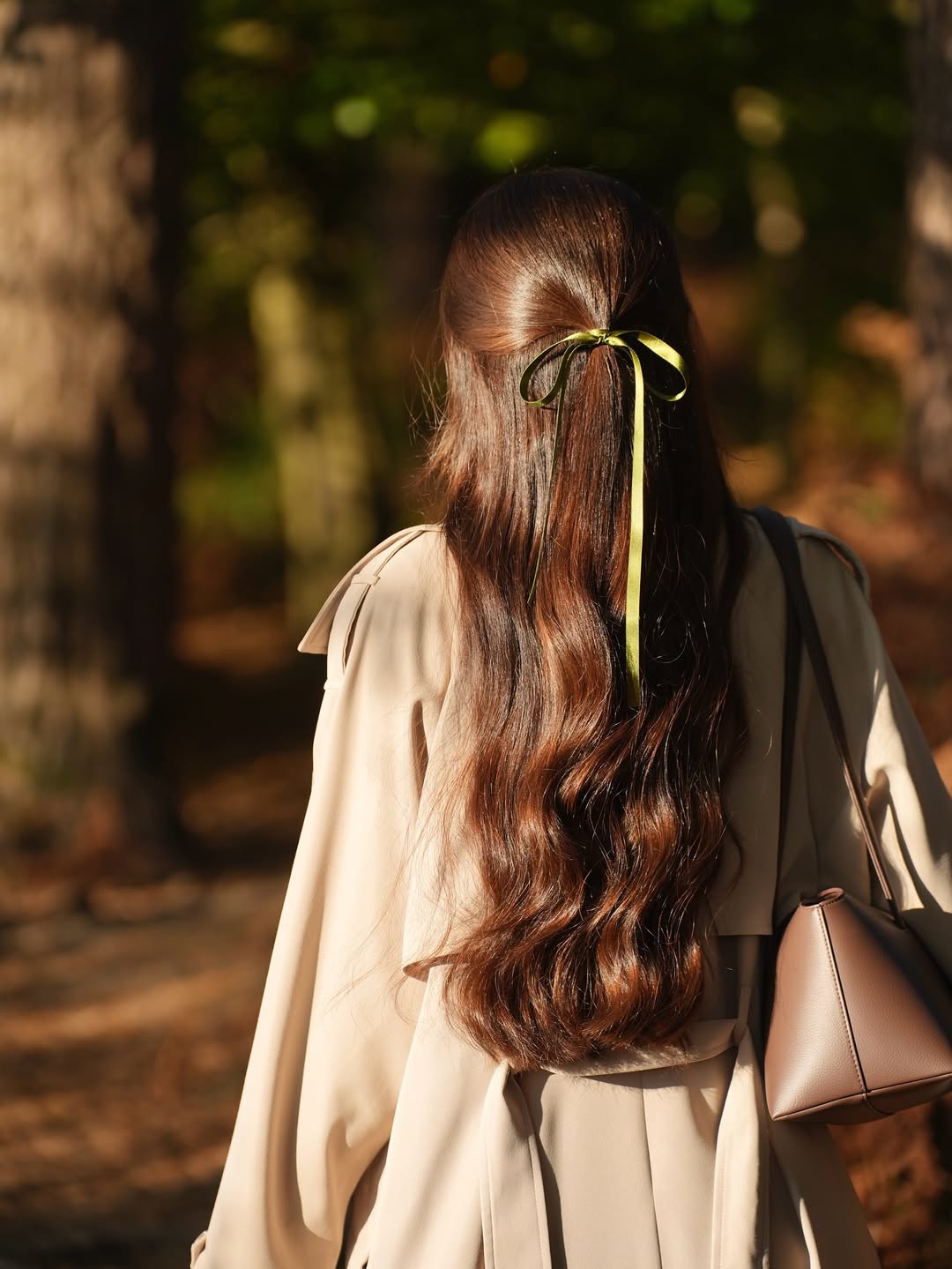 Sophisticated Half-Up Wavy Hair With Green Ribbon