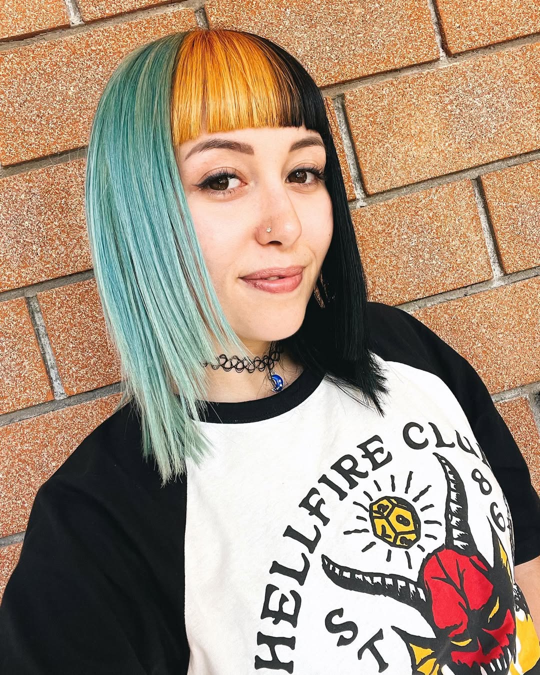 Split Dye Teal And Black Bob With Yellow Bangs