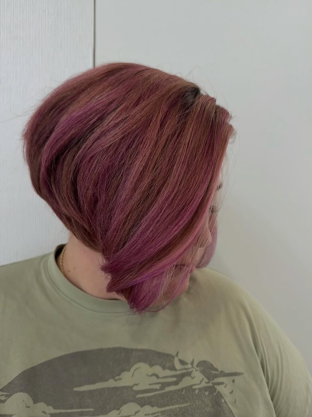 Stacked Red And Magenta Bob With Subtle Pink Highlights