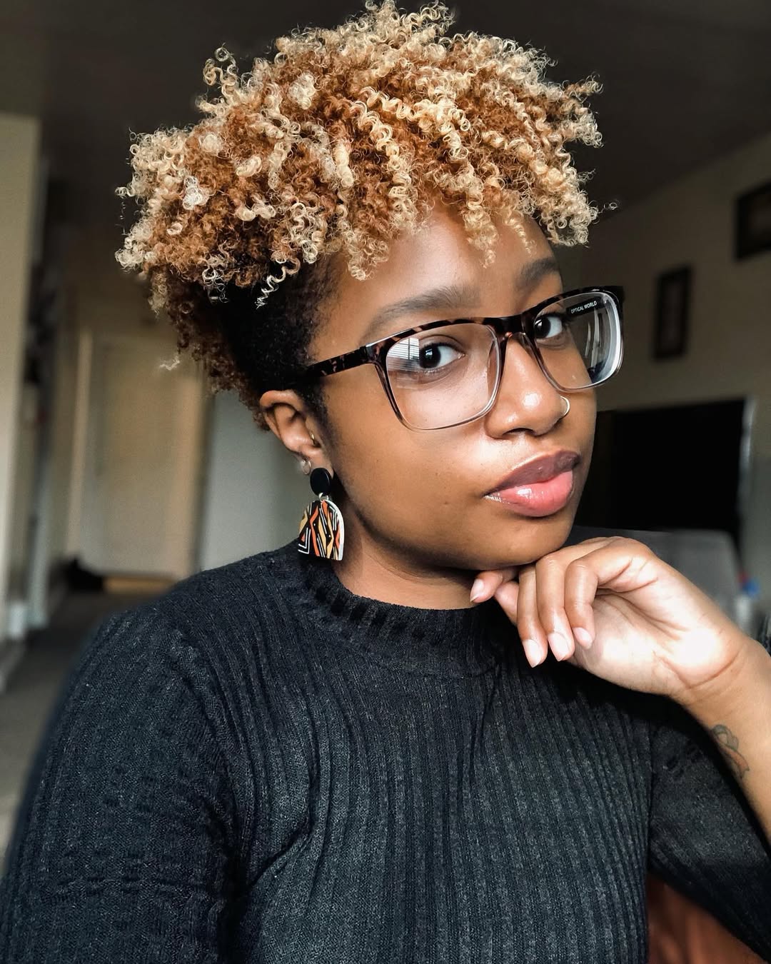 Tapered Curly Blonde Pixie With Dark Roots
